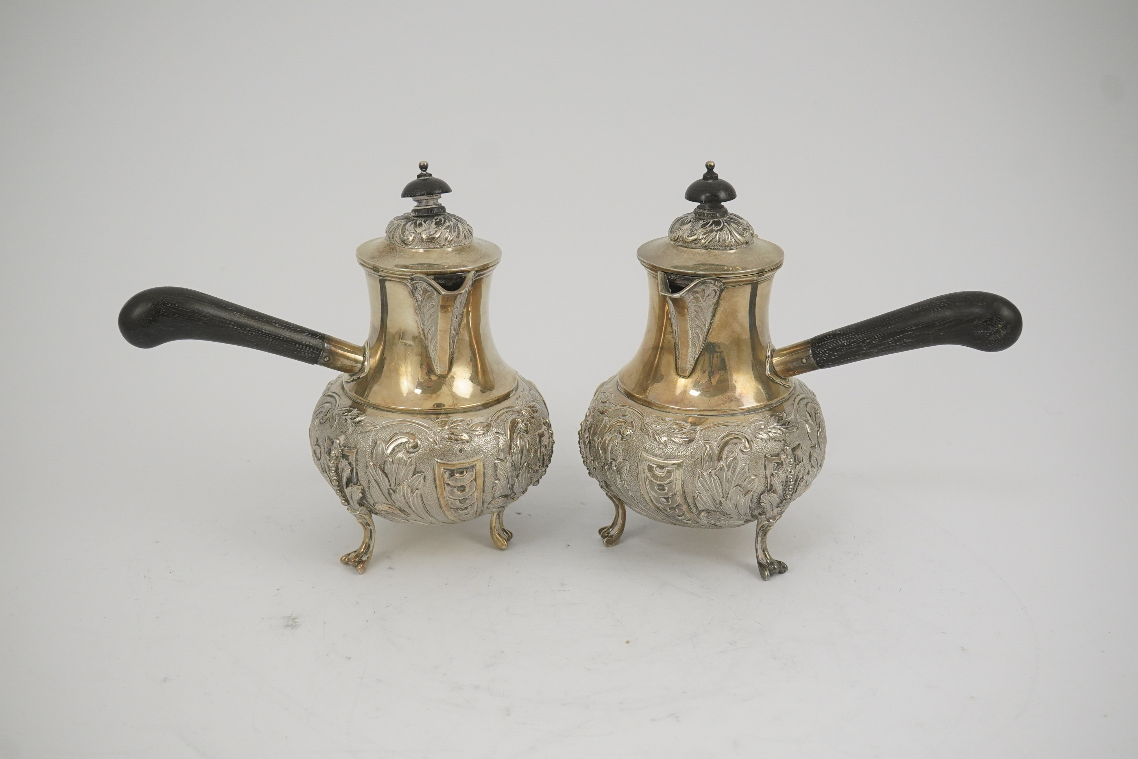 A pair of George V silver chocolate pots, by Goldsmiths & Silversmiths Co Ltd